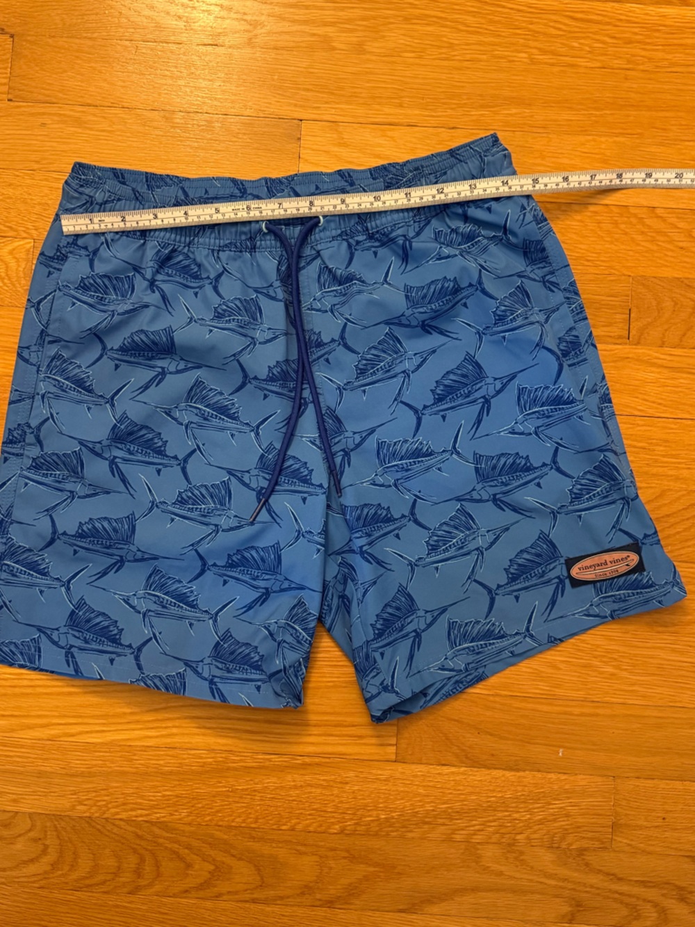 Vineyard Vines Blue Fish print swim trunks. Men size XS, Same as boy XL